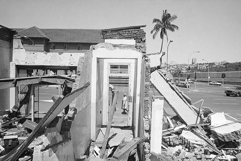 Demolished building. Grey street. 1984