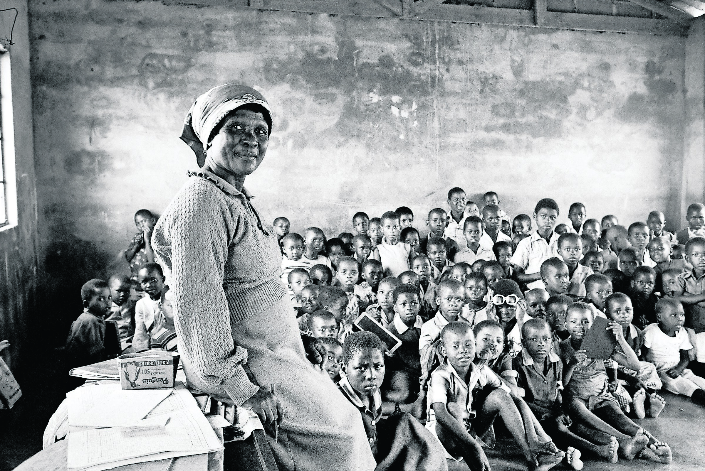 Teacher with class of eighty children, Inanda, Durban, 1983. Credit: Omar Badsha
