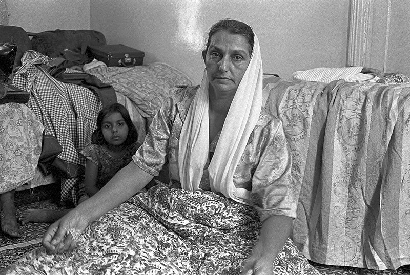 Quilt maker with daughter. Victoria street. 1980