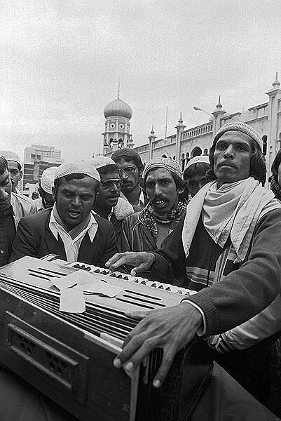Singers leading the procession. Badsha Pir birthday celebrations. Grey street. 1986