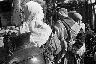 Women at communal water point. Kemise